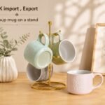 طقم مجات شوربة سيراميك 4 قطع AK import مع حامل معدني ذهبي فاخر – نقش بارز وألوان باستيل أنيقة
